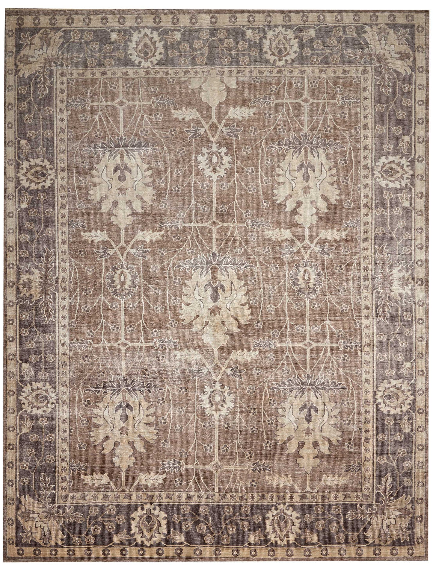 Rectangular wool rug with vintage Oriental style; beige-tan field, cream floral motifs, and a dark brown border.