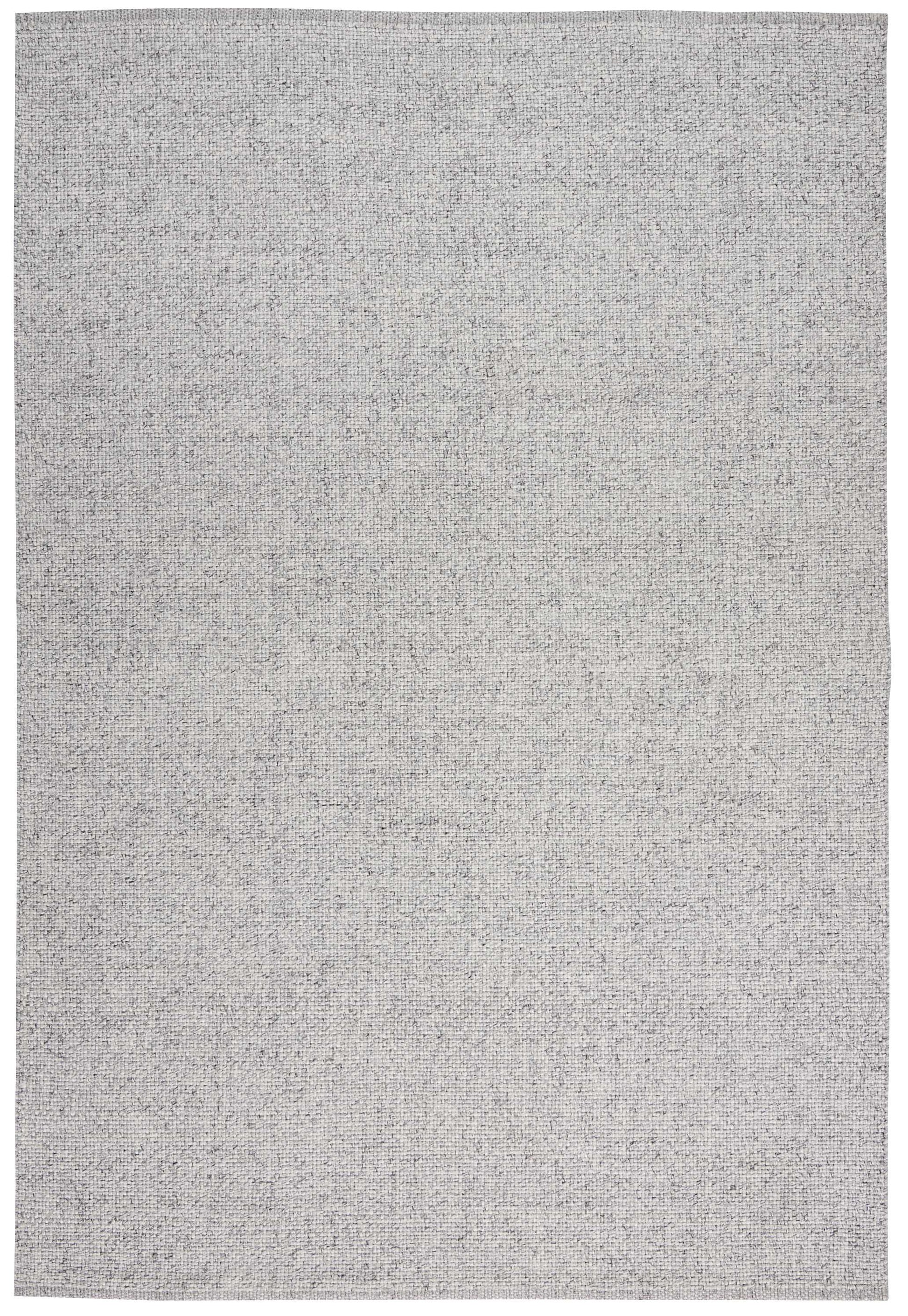 Light gray textured flatweave rug with speckled weave, rectangular area rug for living room or bedroom.