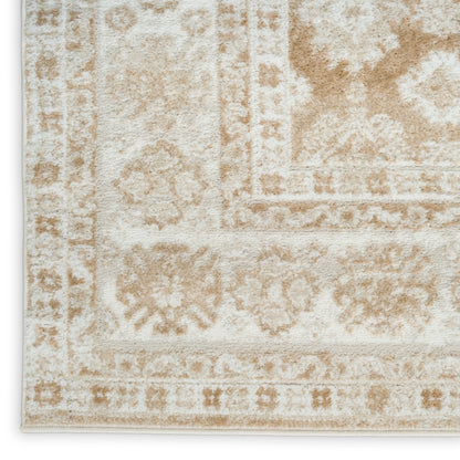 Beige cream oriental rug with muted floral medallions and decorative border, soft textured pile.