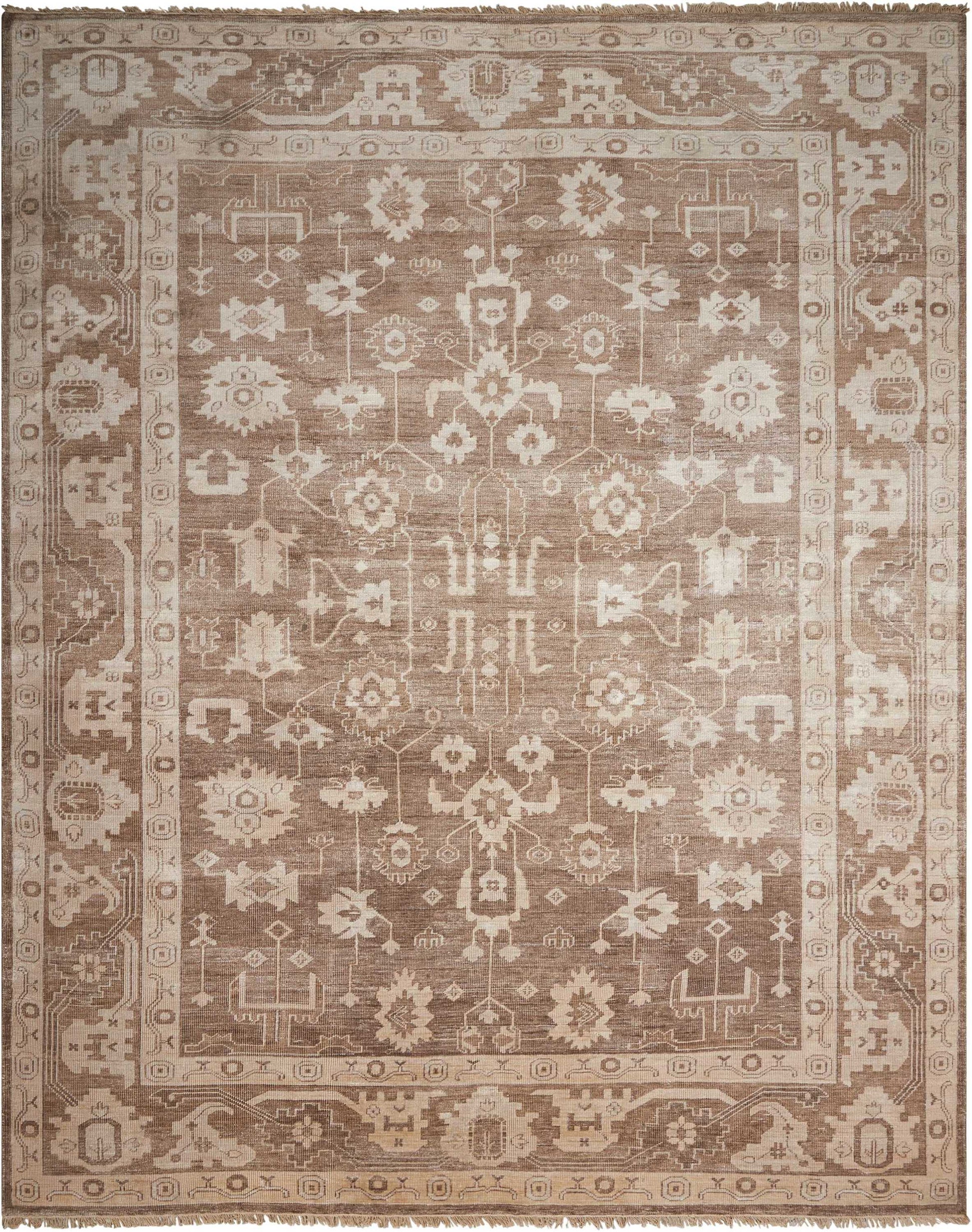Rectangular beige-brown oriental rug with intricate floral-geometric center and decorative border; vintage distressed.