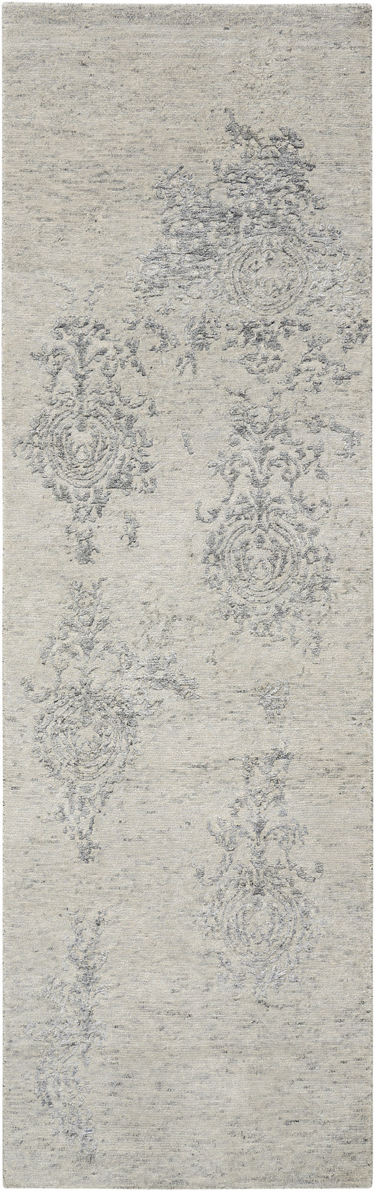 Light gray-beige distressed runner rug with muted ornate damask medallions and scrollwork.