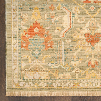 Traditional Persian-style area rug in beige, blue and coral with floral medallions and fringed edges.