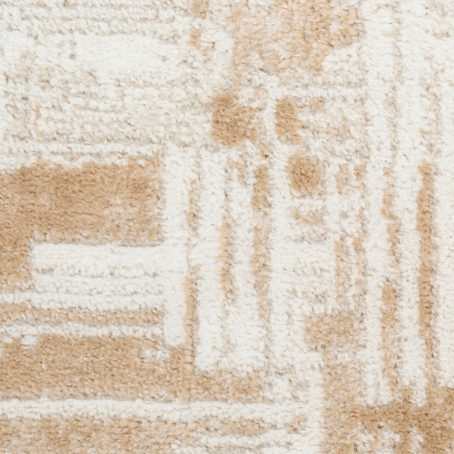 Cream and tan geometric shag rug with tufted texture and blocky pattern.