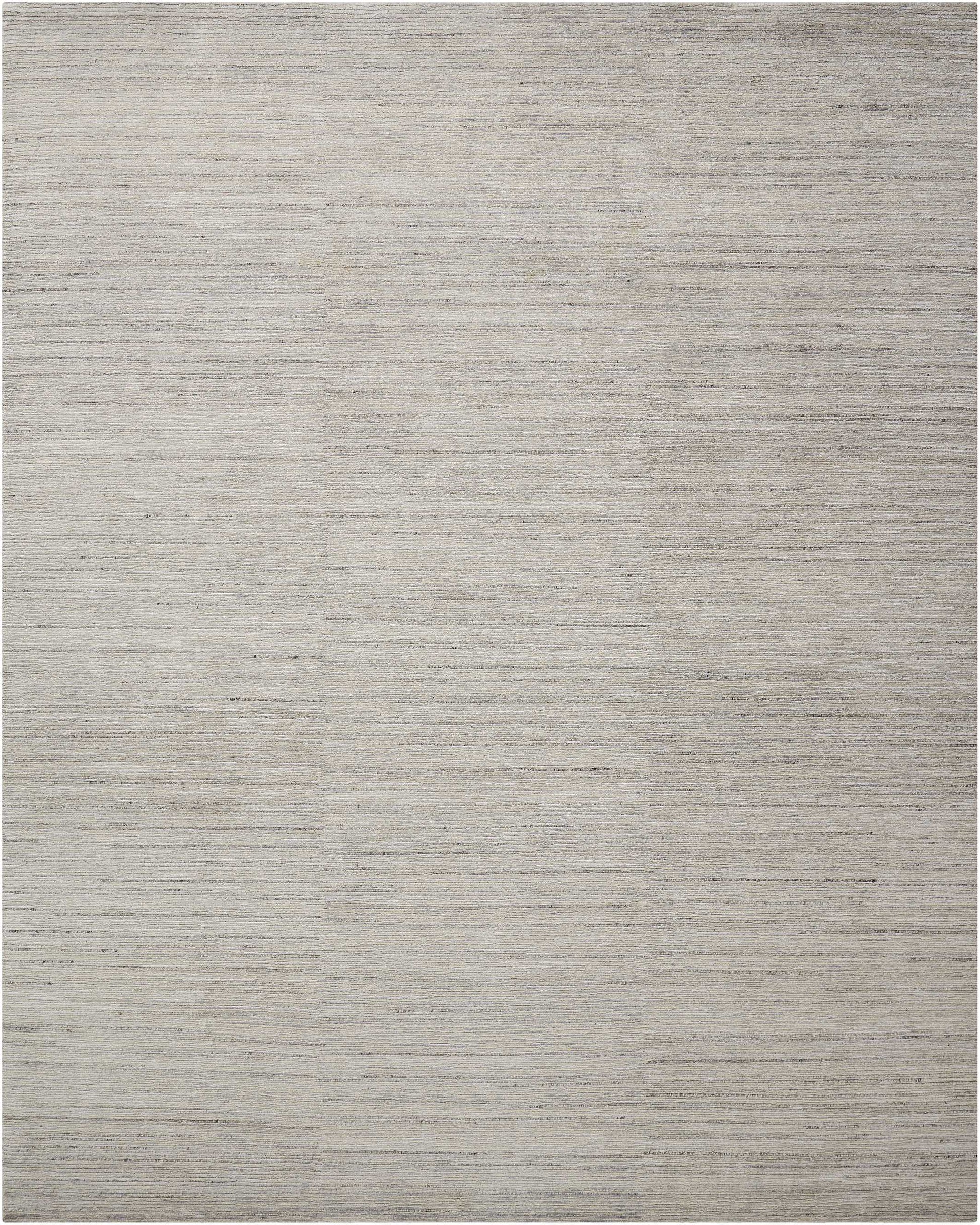 Neutral gray-beige flat-weave rug with subtle horizontal striations; modern, versatile home decor