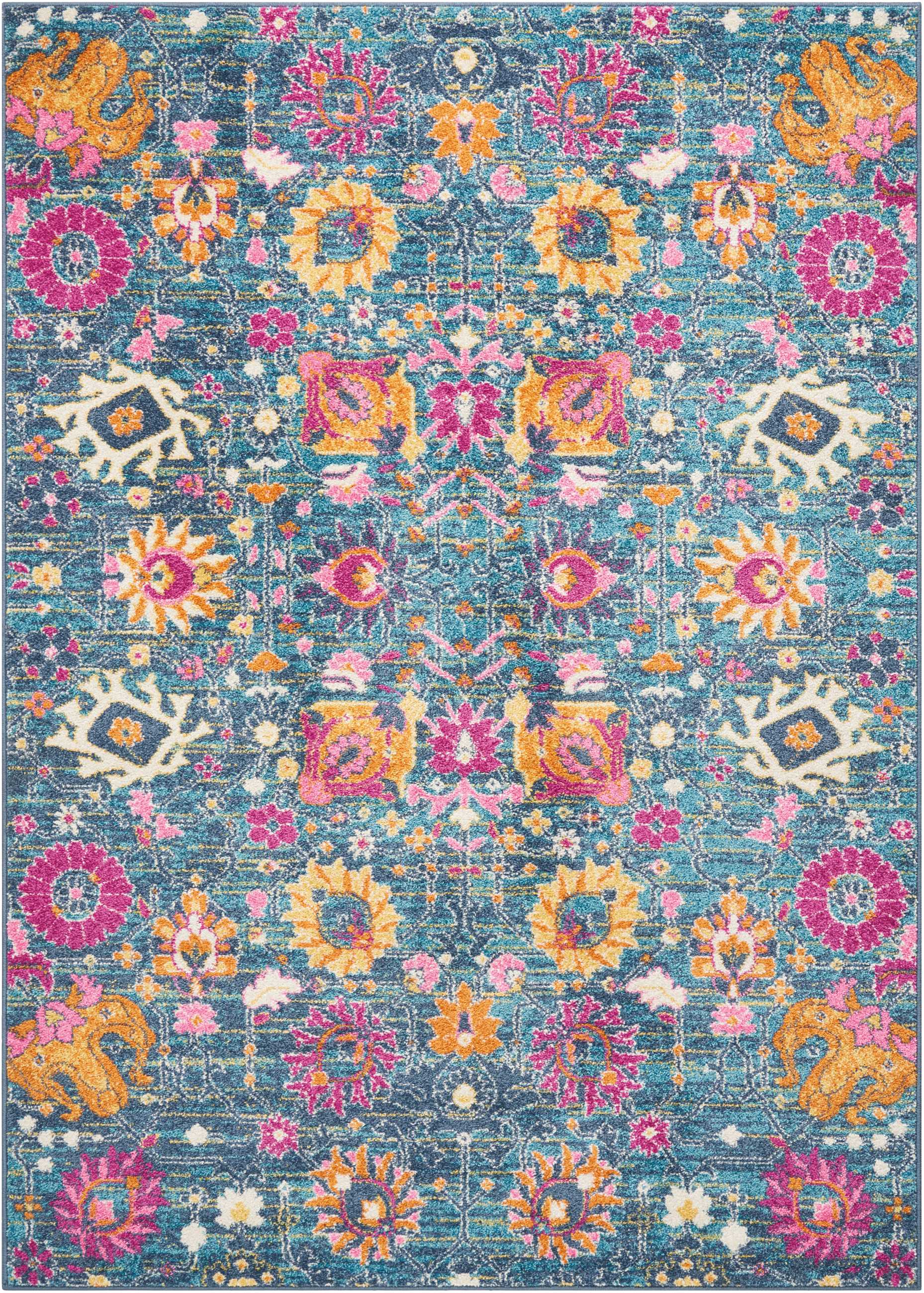 Vibrant teal area rug with pink, yellow and orange floral motifs and geometric medallions in an ornate pattern.