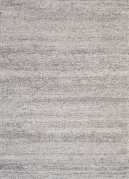 Light gray flat-weave rug with subtle heathered texture and horizontal tonal bands.
