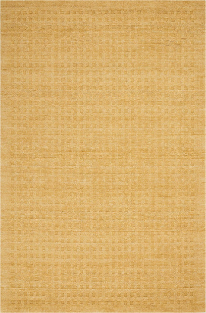 Golden beige area rug with a subtle square-grid pattern and warm, low-pile texture.