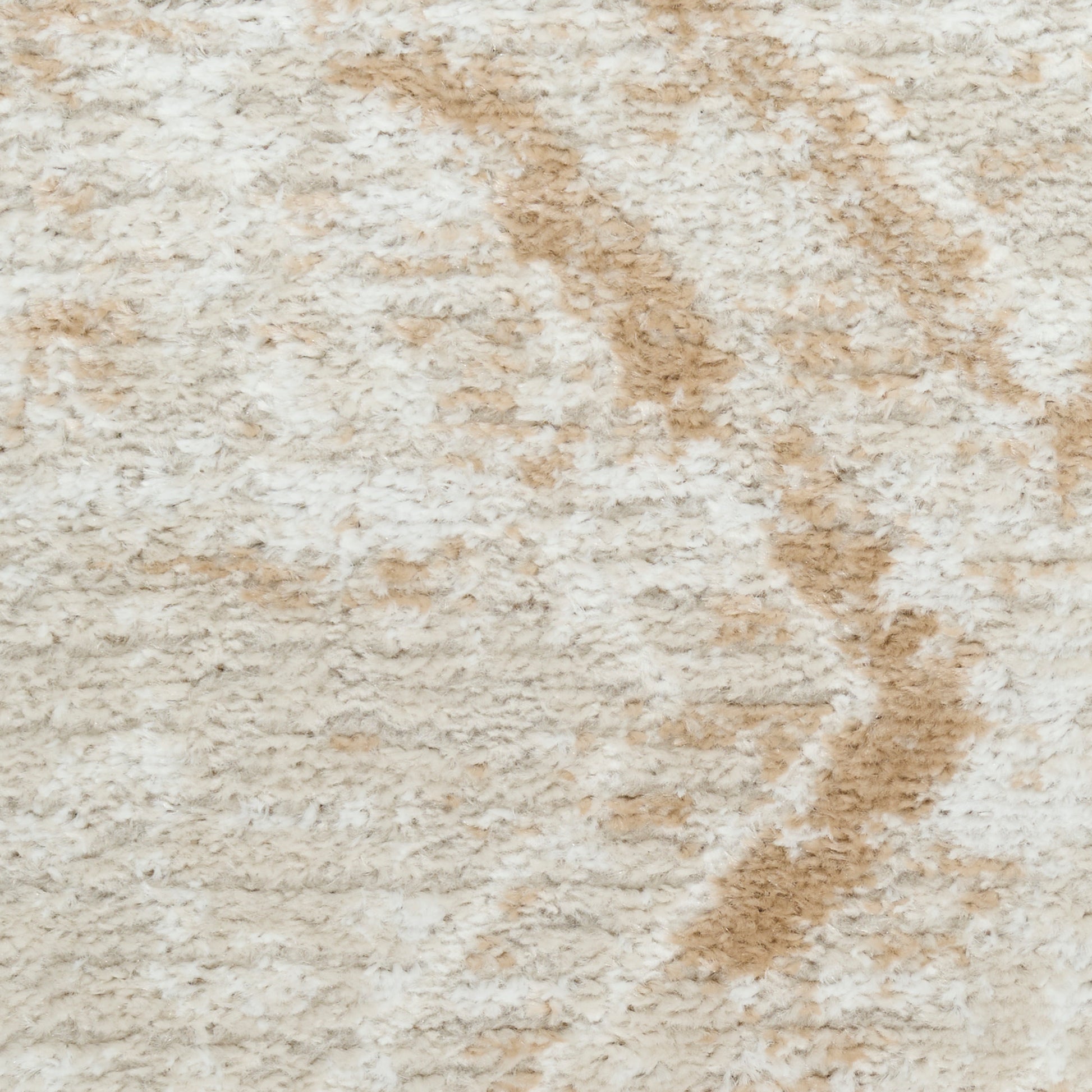 Rectangular cream shag rug with tan abstract pattern; soft, plush texture for living room floors.