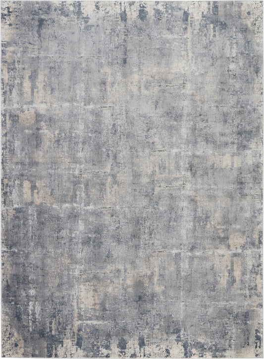 Blue-gray abstract distressed area rug with beige highlights; soft modern floor decor for living spaces.