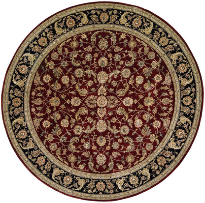 Round oriental rug with deep red center, gold trellis floral pattern and ornate black/gold border.