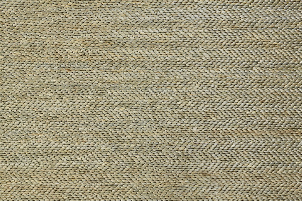 5' X 8' Tan Orange And Brown Hand Woven Area Rug