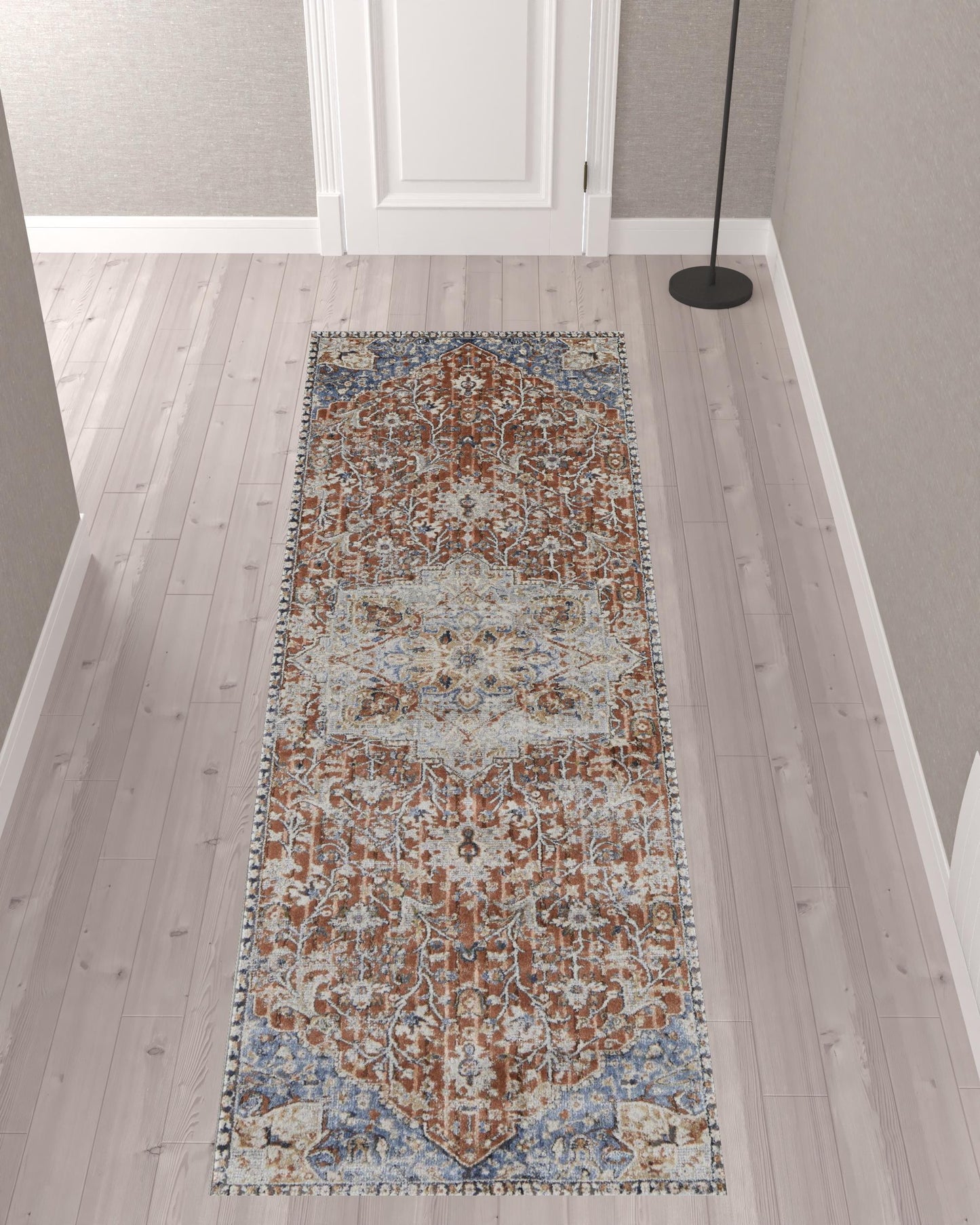 5' X 8' Orange Ivory And Blue Floral Power Loom Area Rug With Fringe