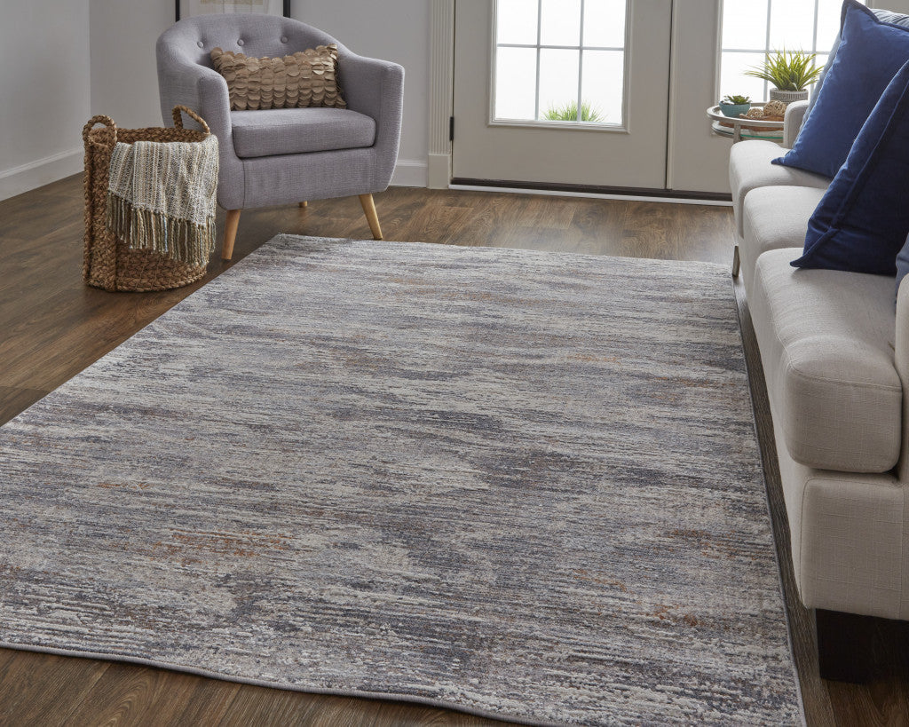 8' X 10' Taupe Tan And Orange Abstract Power Loom Distressed Stain Resistant Area Rug