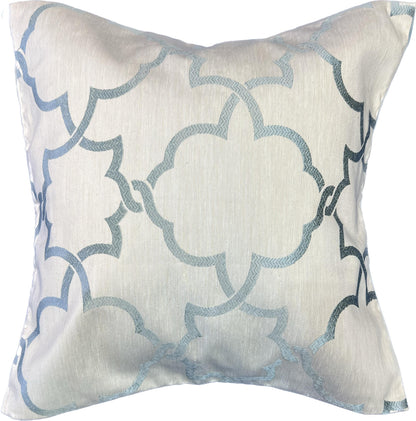 Beige pillow cover with a blue geometric motif on the face and a solid velvet back; two-sided design.