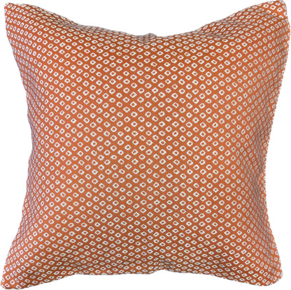 Rust orange square pillow cover with a small dot pattern woven on both sides.